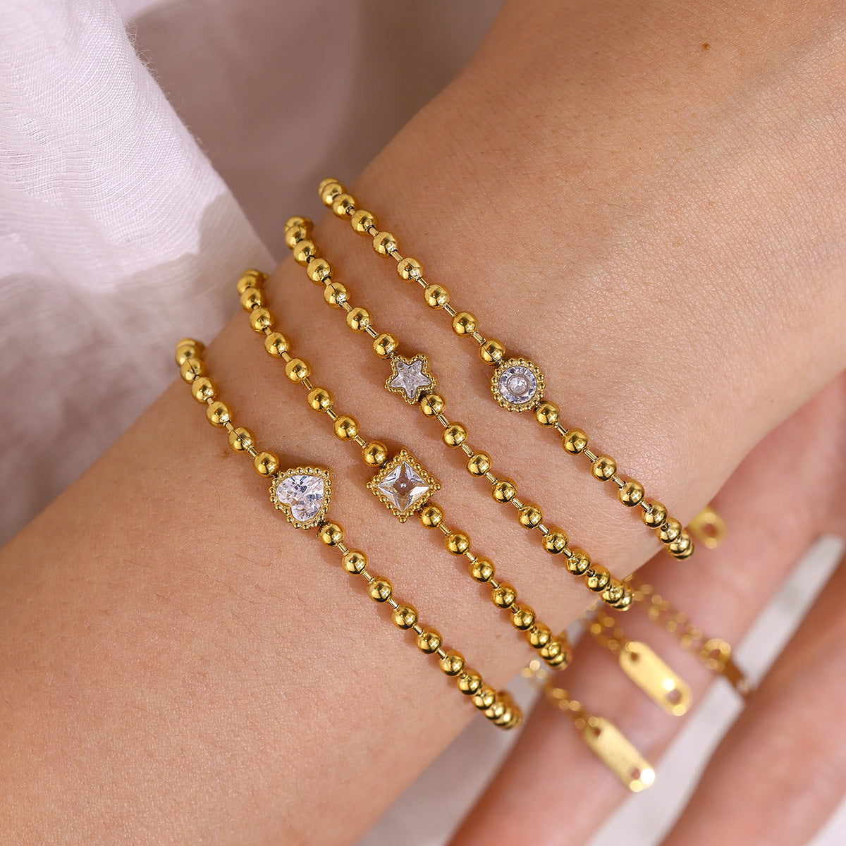 18K Gold Plated Titanium Steel Fashion Layered Small Gold Bead Chain Bracelet Set – Simple Geometric Designs with Crystal Inlays, Heart and Star Pendants