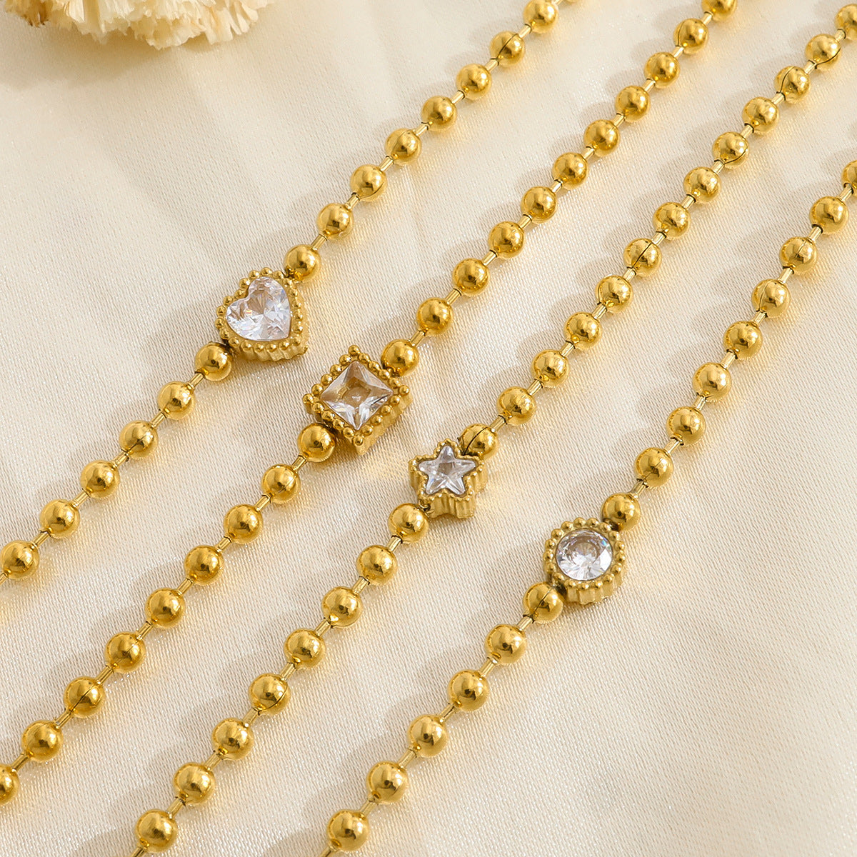 18K Gold Plated Titanium Steel Fashion Layered Small Gold Bead Chain Bracelet Set – Simple Geometric Designs with Crystal Inlays, Heart and Star Pendants