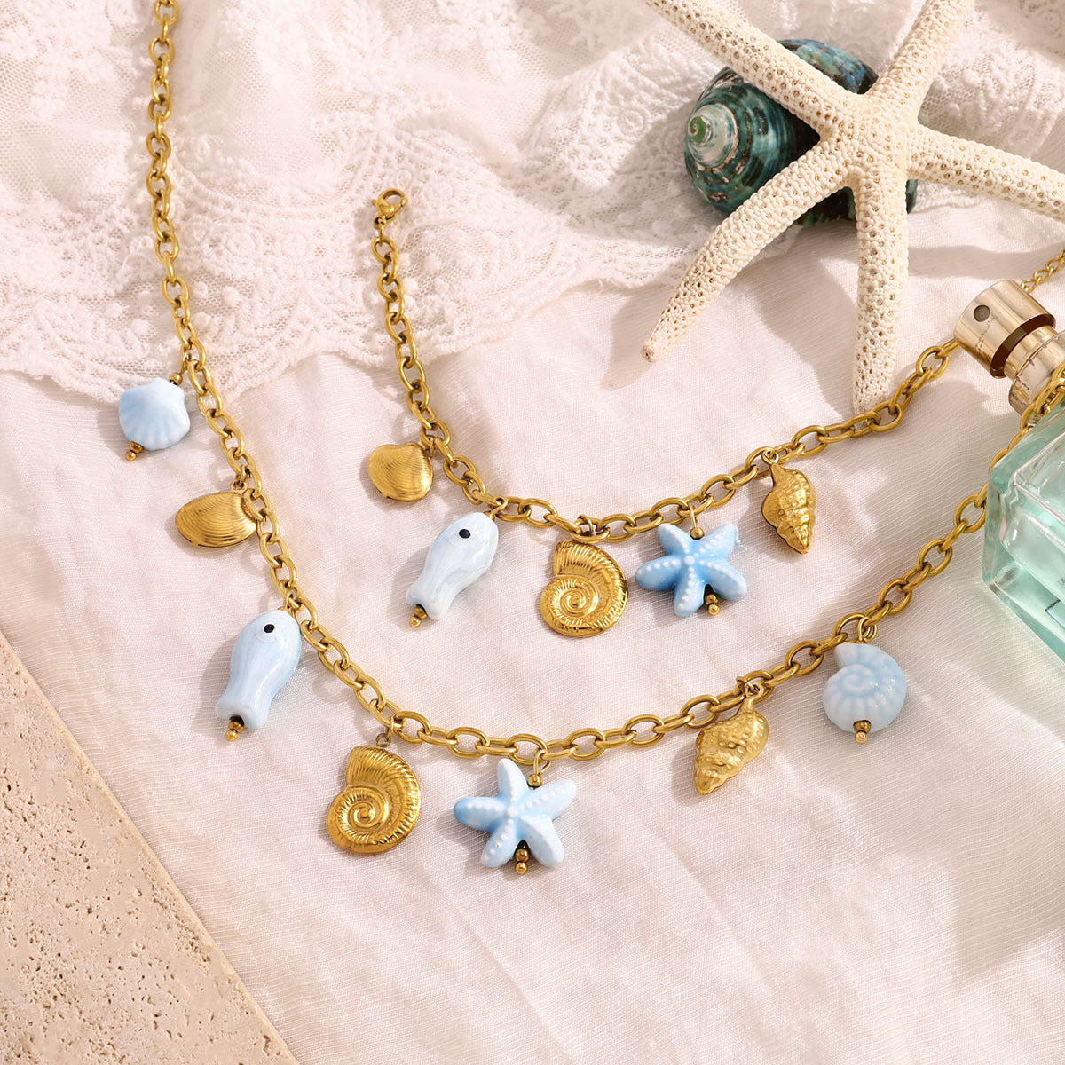 18K Gold Plated Stainless Steel Creative Ocean Style Starfish, Shell, and Seahorse Pendant Necklace & Bracelet Set