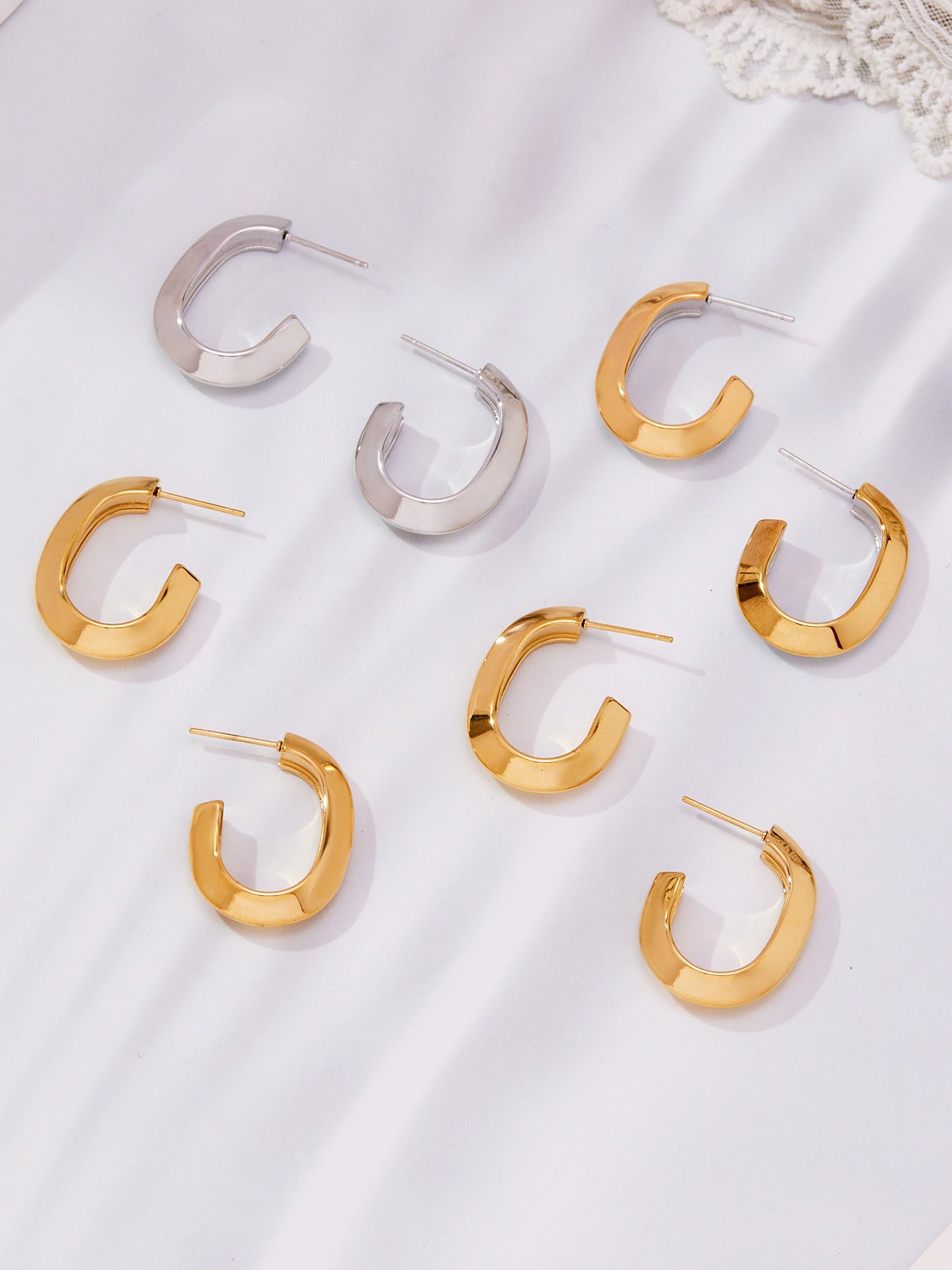 Stainless Steel Oval Hoop Earrings – Minimalist Polished Metal Huggie Earrings for Women, Fashion Statement Jewelry
