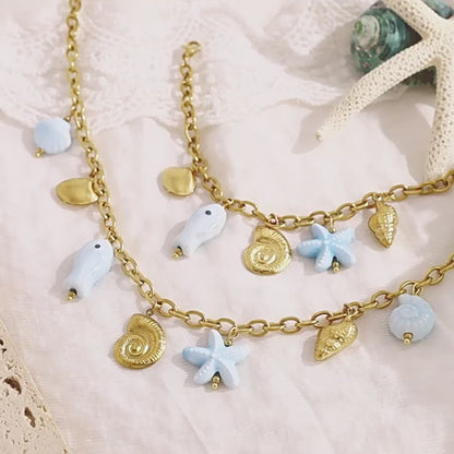 18K Gold Plated Stainless Steel Creative Ocean Style Starfish, Shell, and Seahorse Pendant Necklace & Bracelet Set