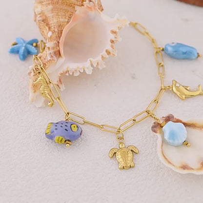 18K Gold Plated Titanium Steel Ocean Pendant Necklace | Seahorse, Starfish, Shell, Turtle, Fish & Dolphin Designs