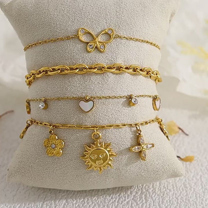 18K Gold Plated Titanium Steel Fashion Layered Butterfly Heart Flower Bracelet Set – Luxe Versatile Design